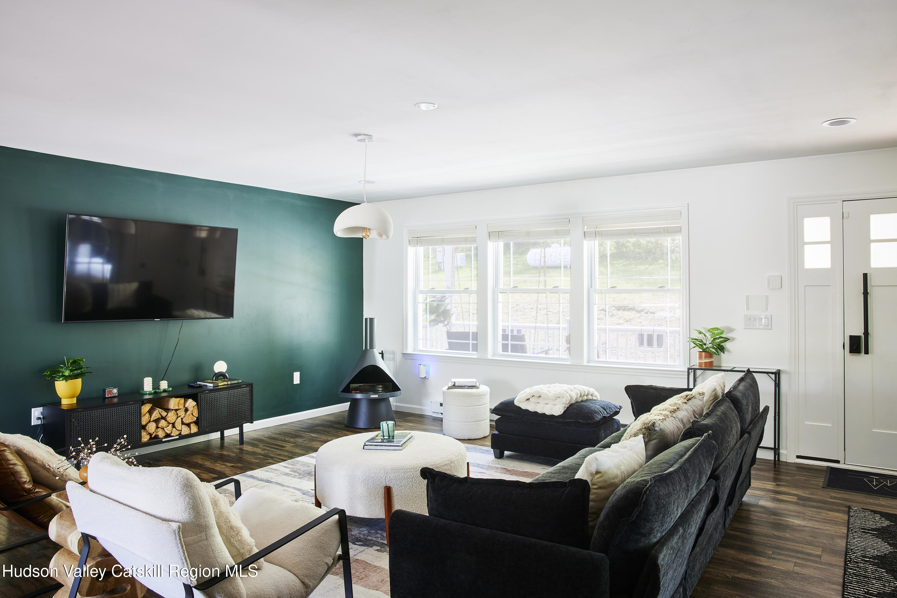 55 Hunter Road Parksville, NY 12768 - Photo 5 of 35 a living room with furniture and a flat screen tv