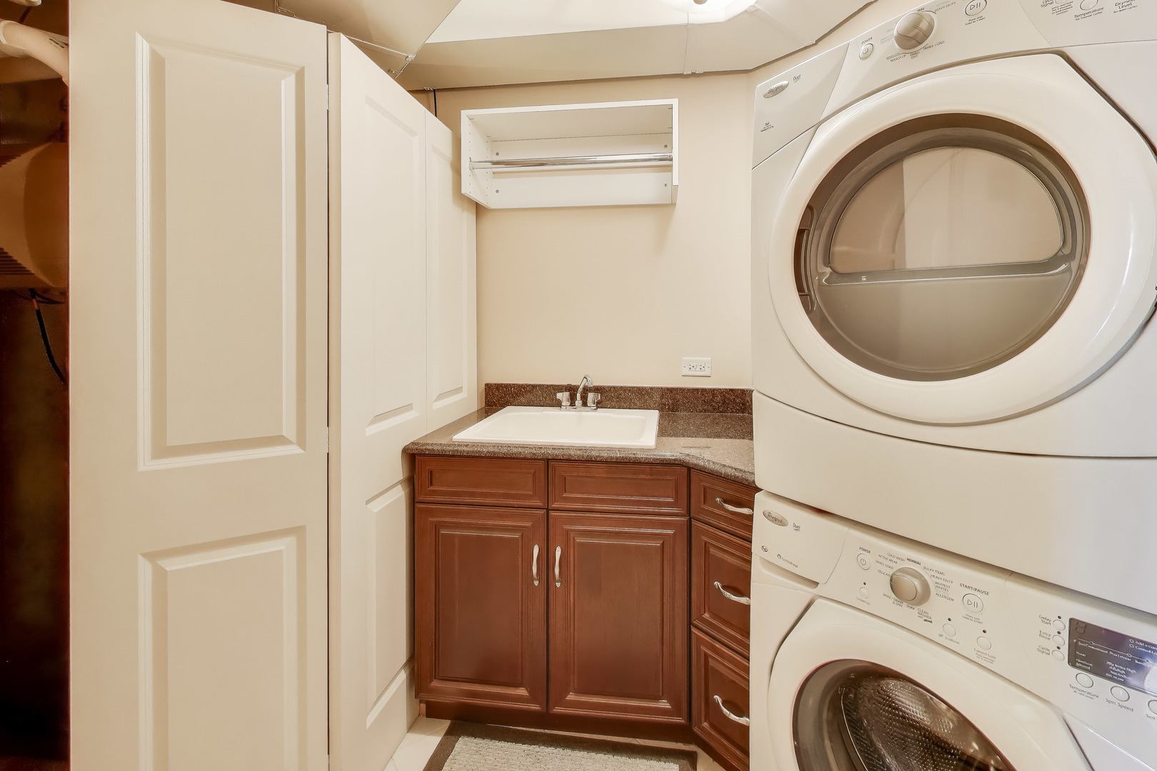 10 East Burlington Street, Unit 2B Riverside, IL 60546 - Photo 26 of 38 a utility room with dryer and washer