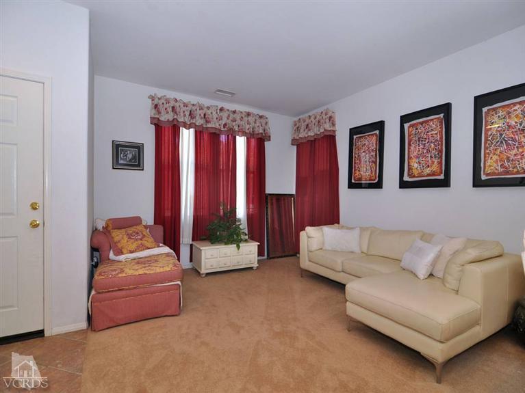 2547 Canterbury Lane Simi Valley, CA 93063 - Photo 4 of 12 a living room with furniture and a large window