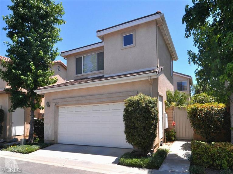 2547 Canterbury Lane Simi Valley, CA 93063 - Photo 7 of 12 a view of a house with a yard and plants