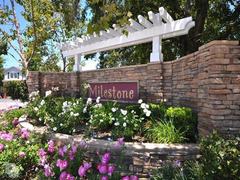 2547 Canterbury Lane Simi Valley, CA 93063 - Photo 8 of 12 a sign that is in front of flowers