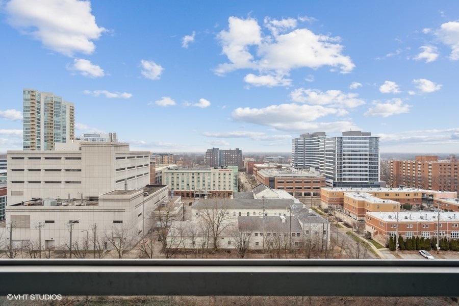 800 Elgin Road, Unit 1304 Evanston, IL 60201 - Photo 16 of 18 a view of a city with tall buildings