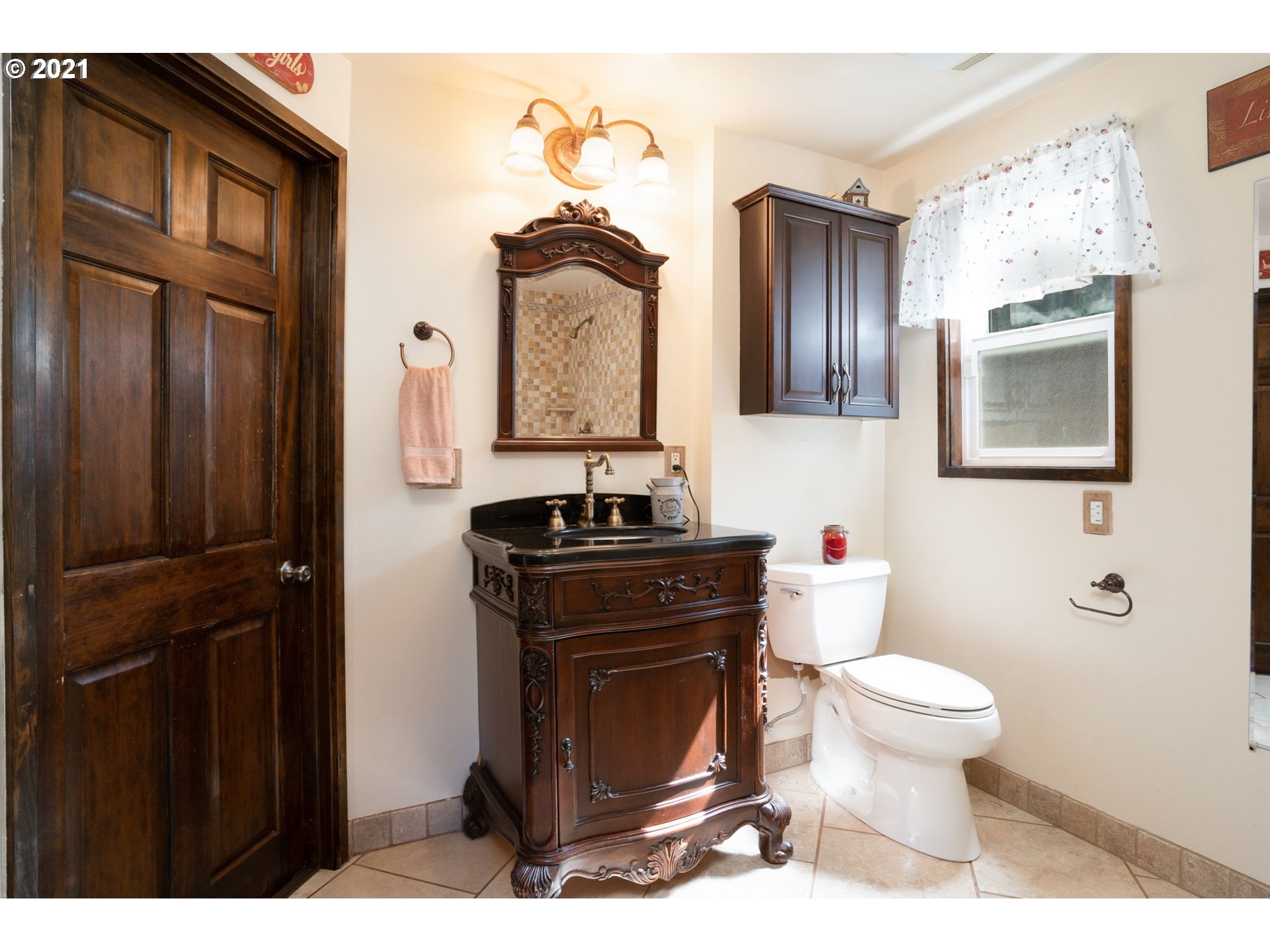 28075 South Kinzy Road Estacada, OR 97023 - Photo 22 of 32 a bathroom with a toilet sink vanity and mirror
