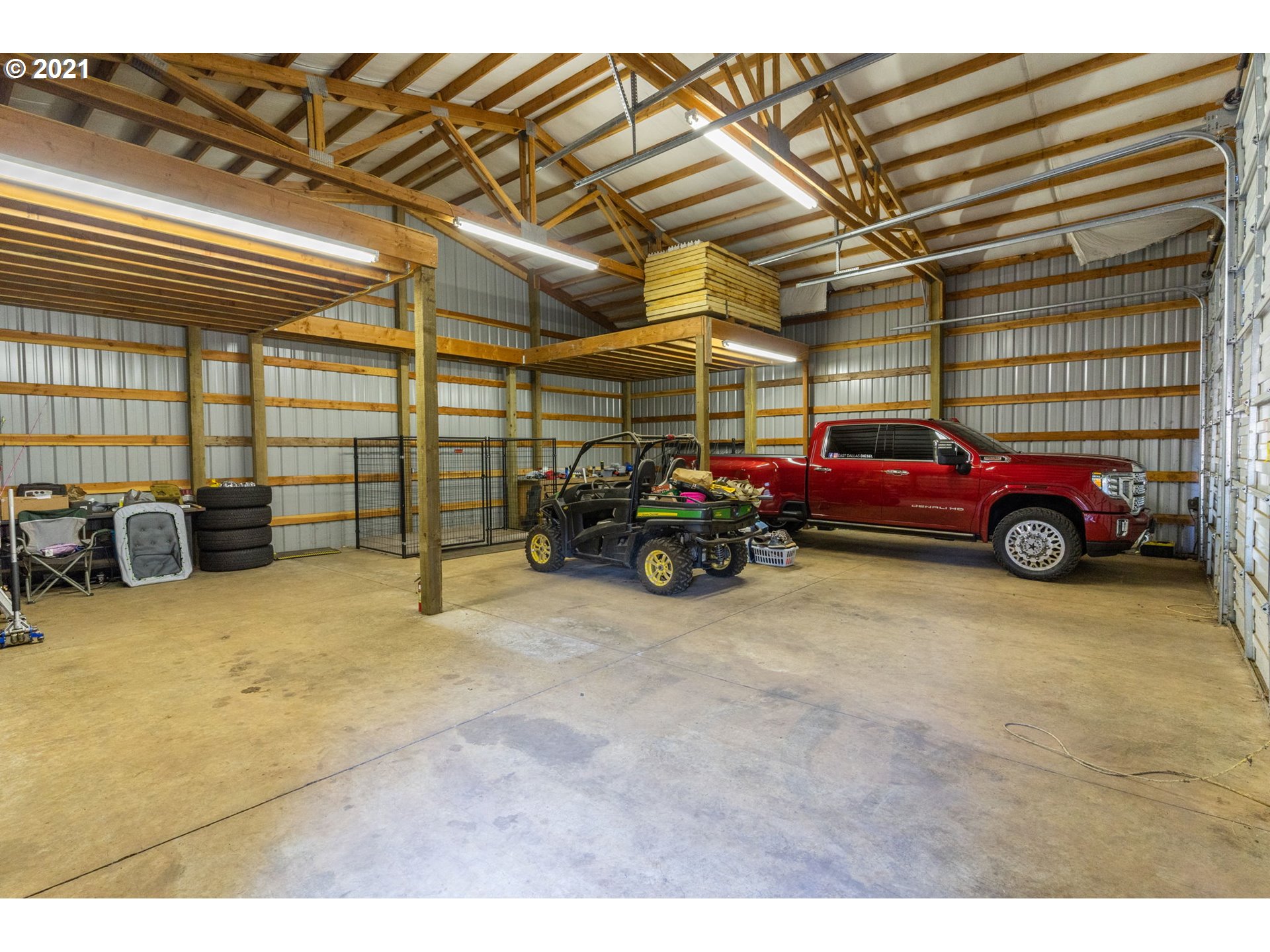 28075 South Kinzy Road Estacada, OR 97023 - Photo 5 of 32 a garage with a car parked