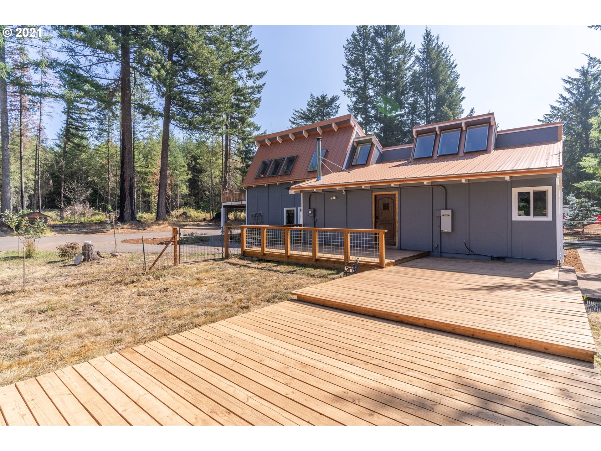 28075 South Kinzy Road Estacada, OR 97023 - Photo 6 of 32 a view of a house with a lounge chair