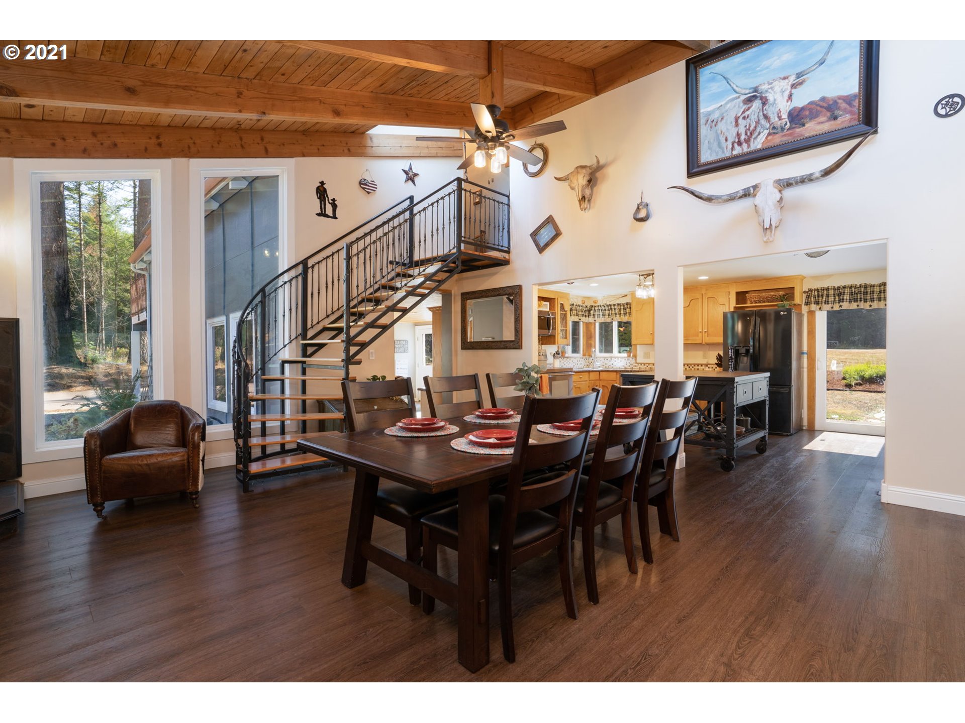 28075 South Kinzy Road Estacada, OR 97023 - Photo 10 of 32 a view of a dining room with furniture and wooden floor