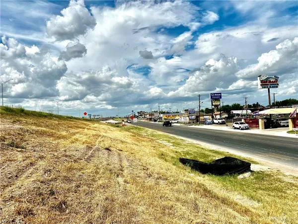 a view of a swimming pool with an ocean view