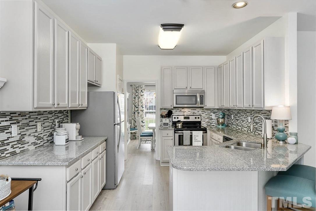 8405 Astwell Court Raleigh, NC 27615 - Photo 9 of 26 Gallery Image 9