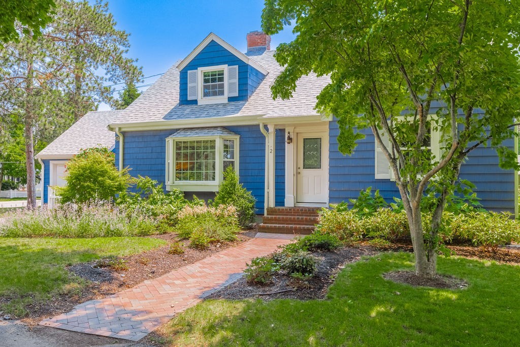 2 Princeton Avenue Beverly, MA 01915 - Photo 1 of 27 a front view of a house with garden