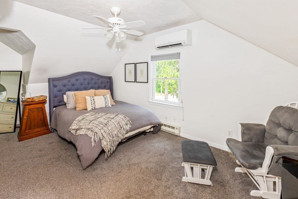2 Princeton Avenue Beverly, MA 01915 - Photo 12 of 27 a bedroom with a bed and window