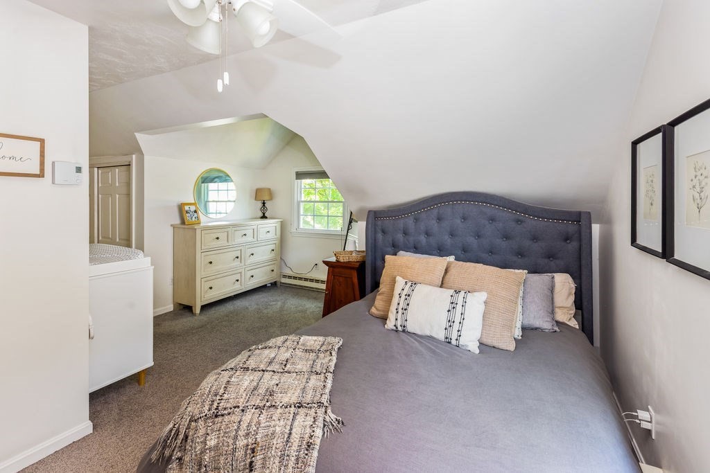 2 Princeton Avenue Beverly, MA 01915 - Photo 13 of 27 a bedroom with a bed and a dresser
