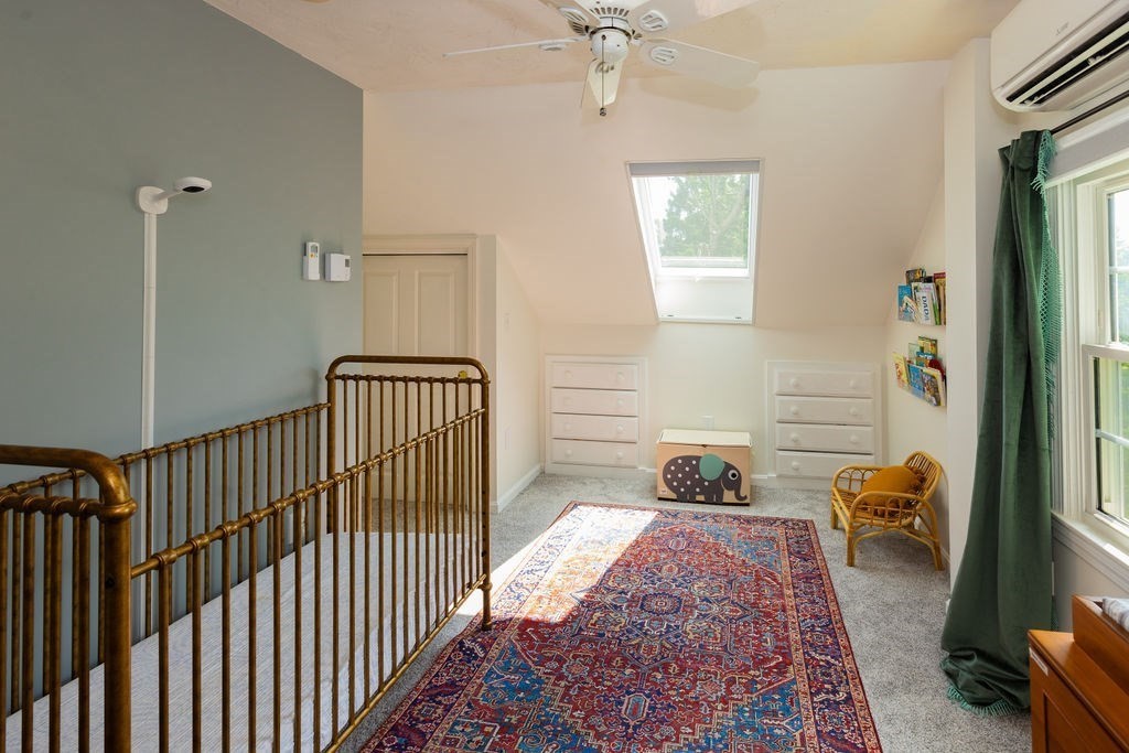 2 Princeton Avenue Beverly, MA 01915 - Photo 15 of 27 a bedroom with a bed and a window
