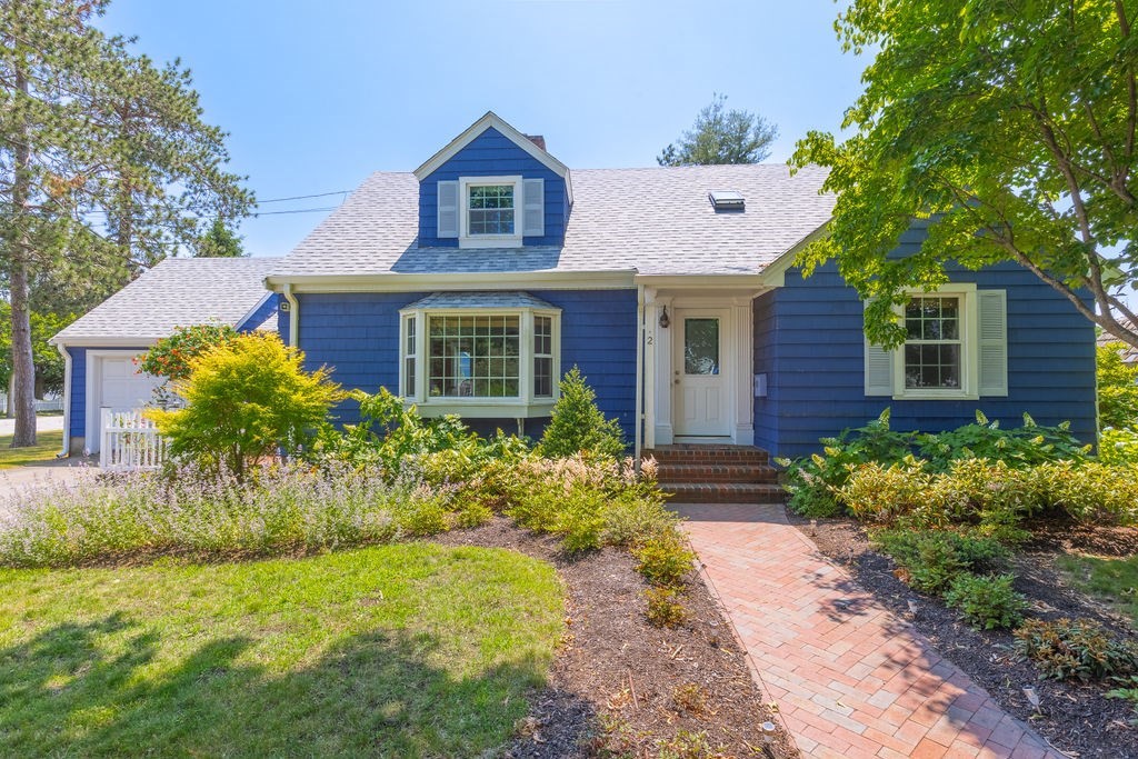 2 Princeton Avenue Beverly, MA 01915 - Photo 2 of 27 a front view of a house with garden