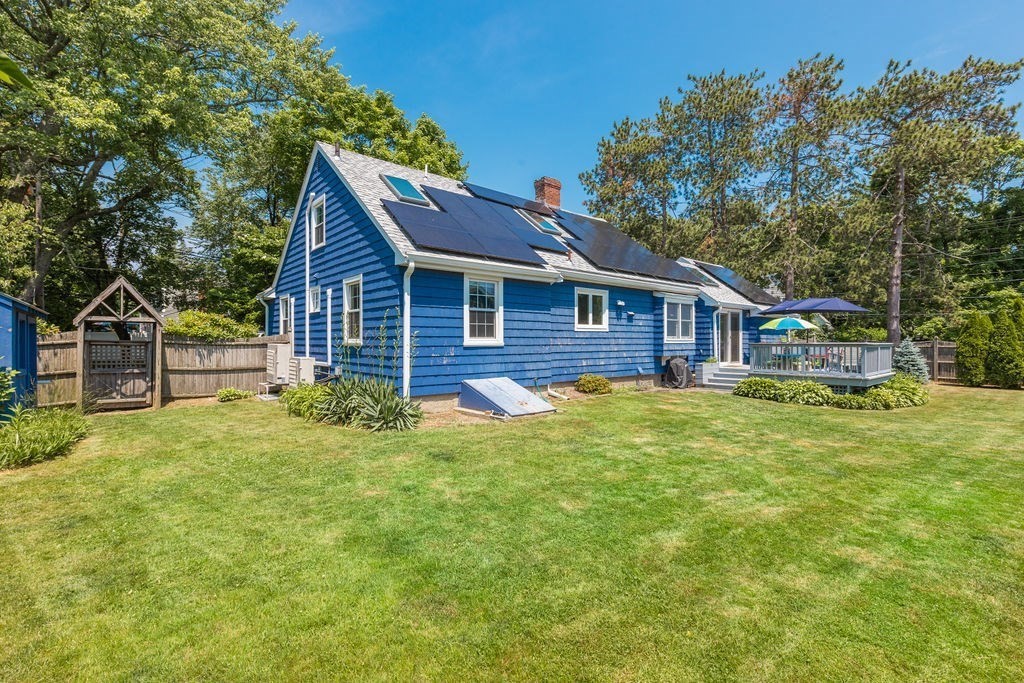 2 Princeton Avenue Beverly, MA 01915 - Photo 23 of 27 a front view of a house with a garden