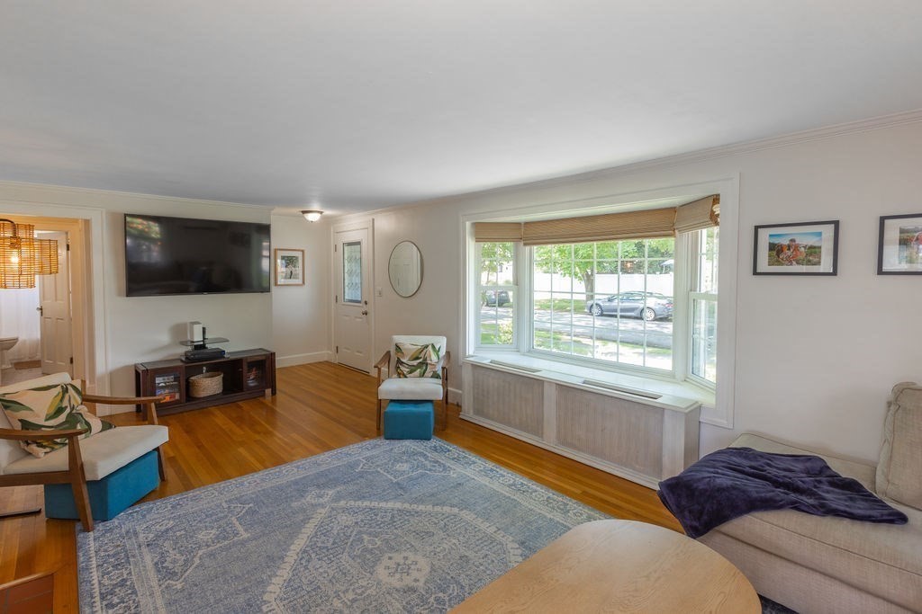 2 Princeton Avenue Beverly, MA 01915 - Photo 8 of 27 a bedroom with a bed and glass window