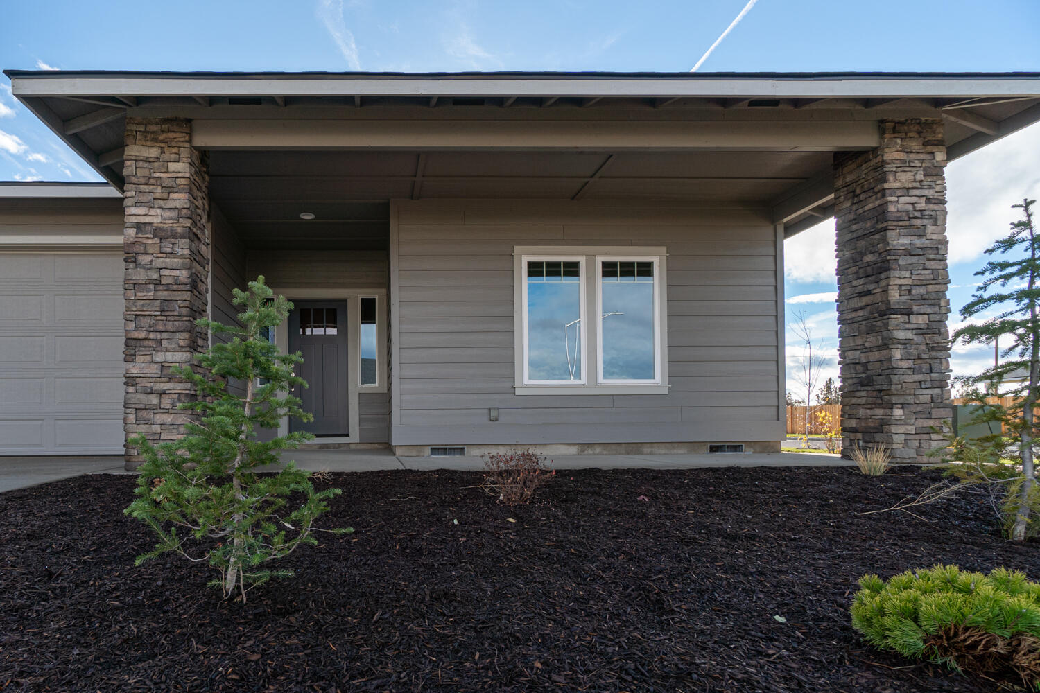 4898 Southwest Zenith Avenue Redmond, OR 97756 - Photo 26 of 32 Close up of front entry.