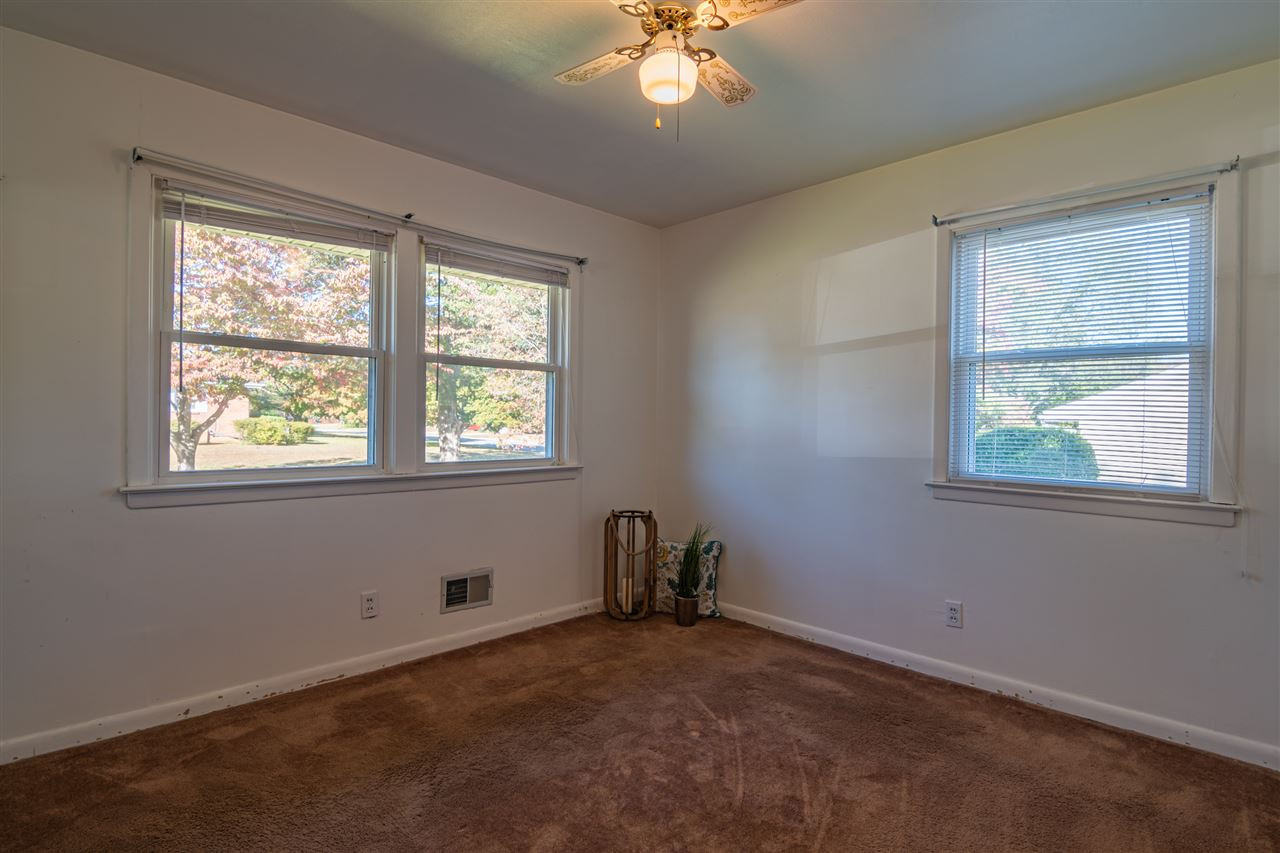 1405 Beichler Road Garner, NC 27529 - Photo 15 of 19 Spacious secondary bedroom with lots of natural light. Bedroom