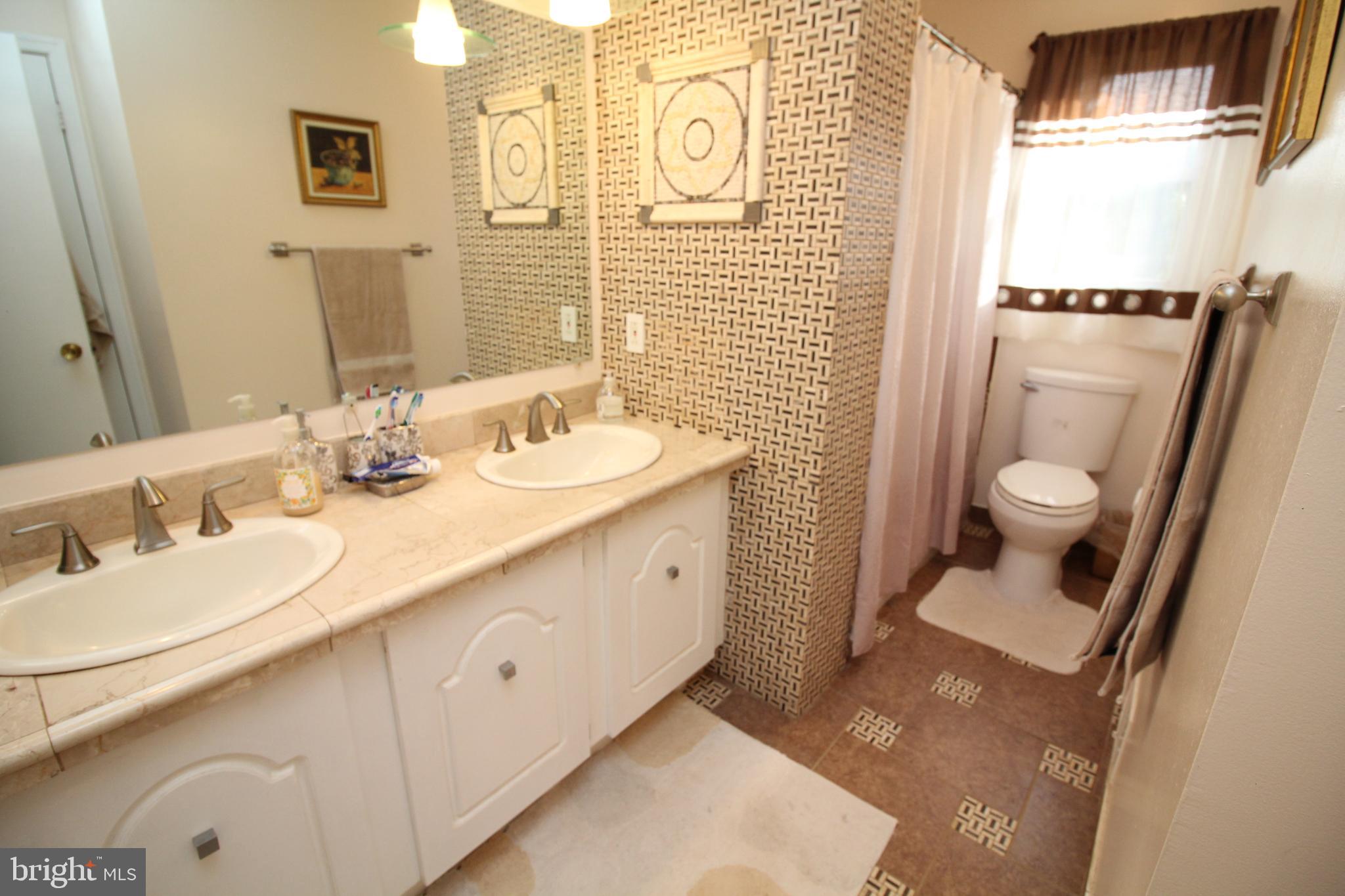 6707 Garrett Road Rockville, MD 20855 - Photo 23 of 25 Hall Bathroom