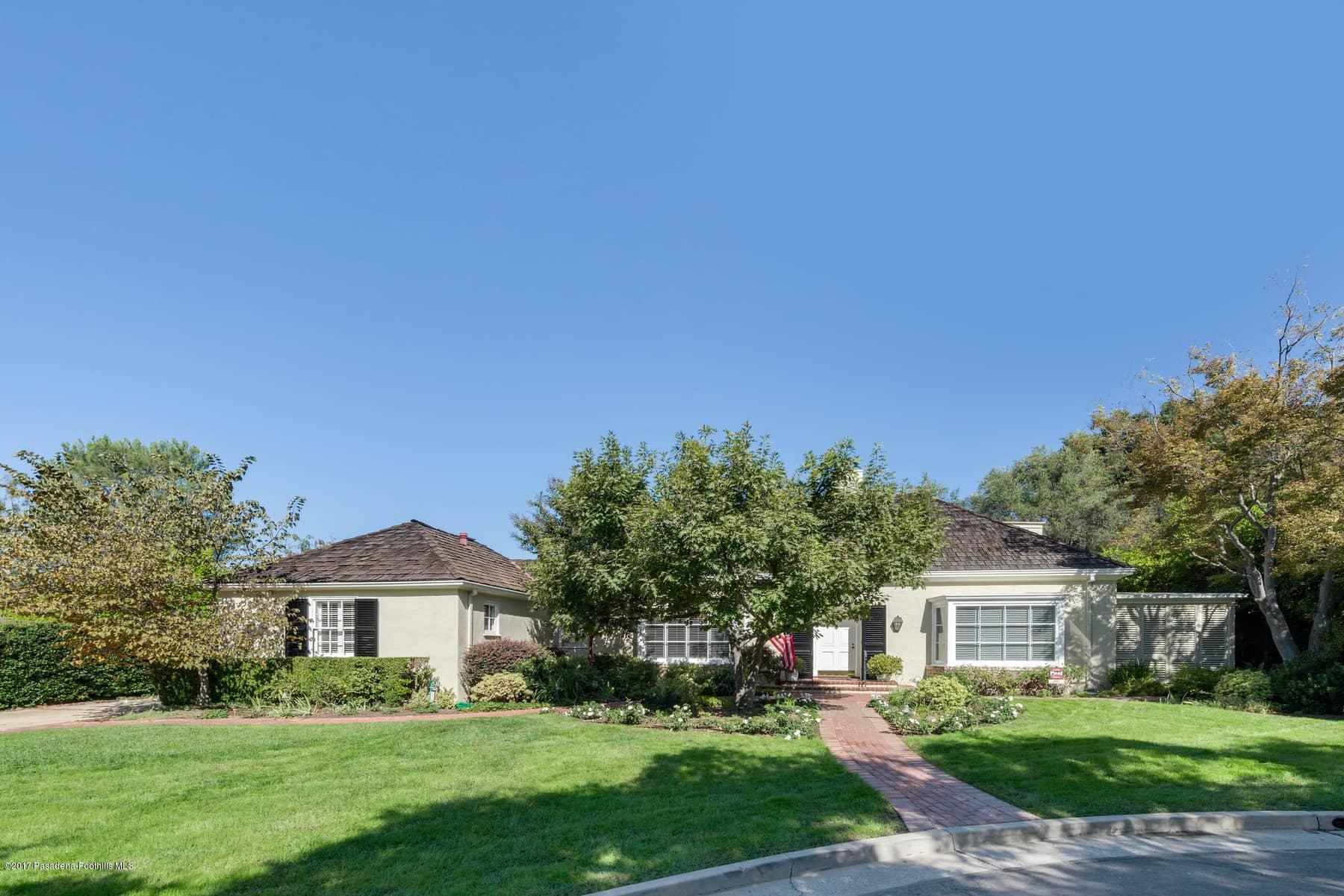 581 Busch Place Pasadena, CA 91105 - Photo 1 of 44 a front view of a house with a yard
