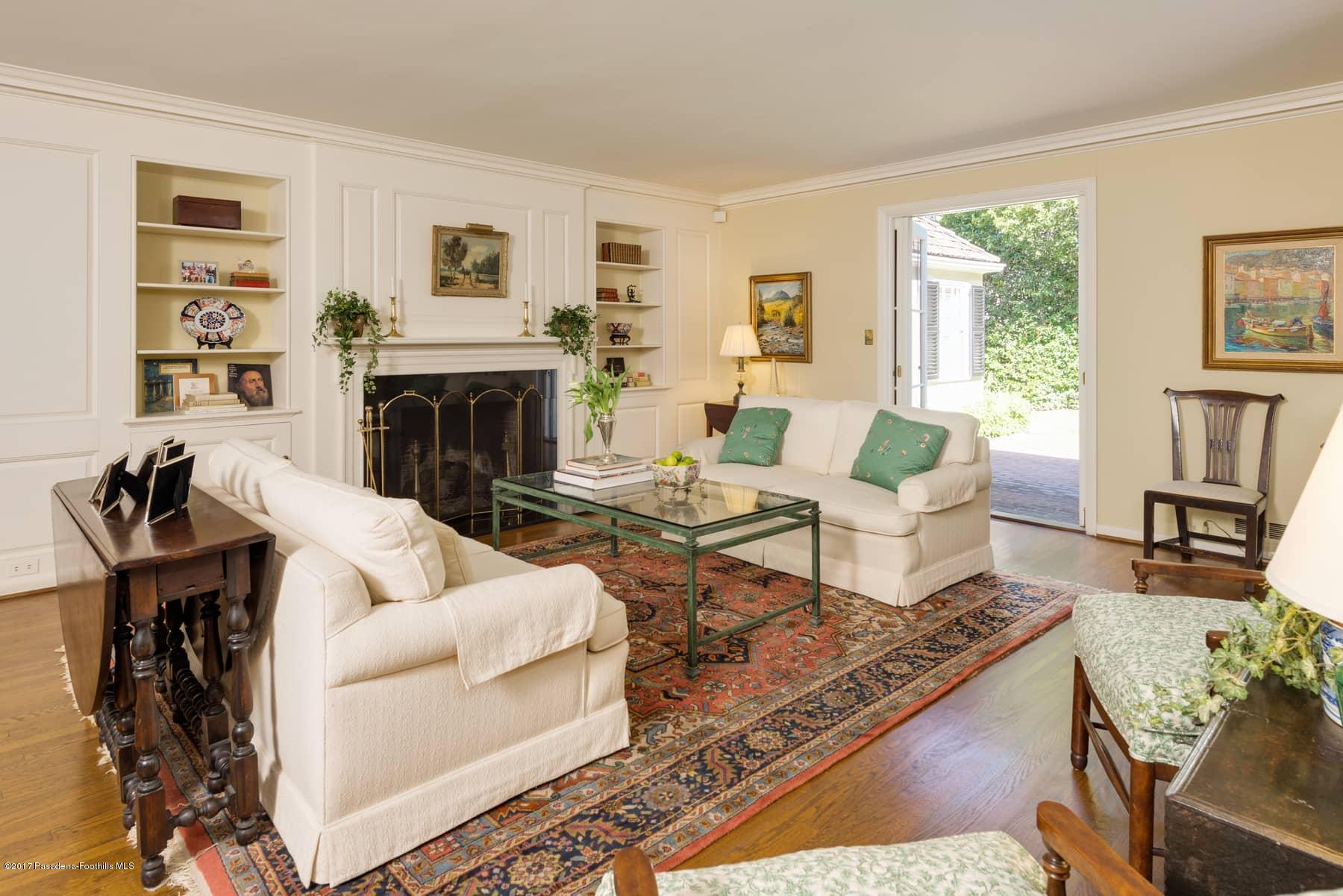 581 Busch Place Pasadena, CA 91105 - Photo 11 of 44 a living room with furniture a fireplace and a window