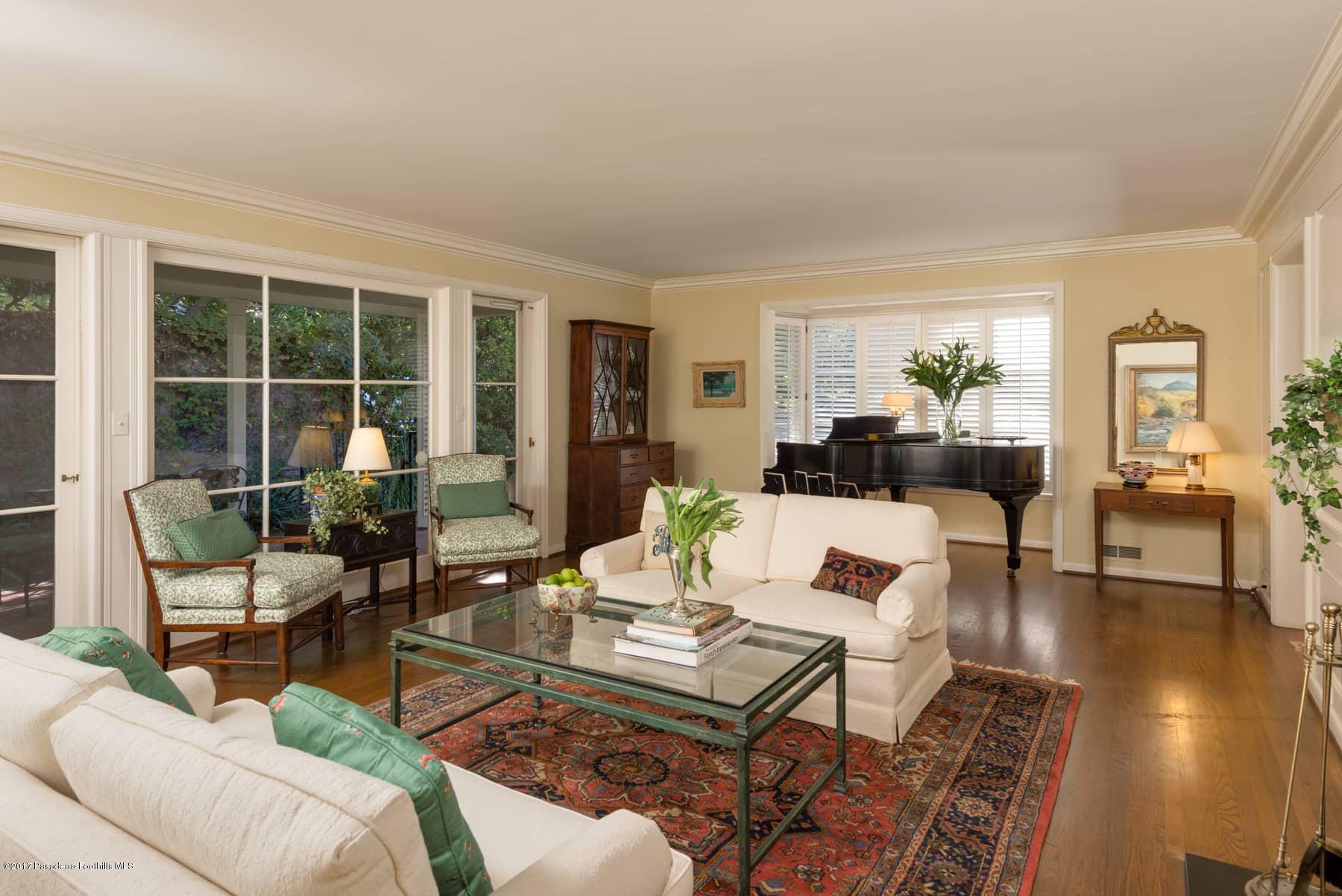 581 Busch Place Pasadena, CA 91105 - Photo 12 of 44 a living room with furniture and a table