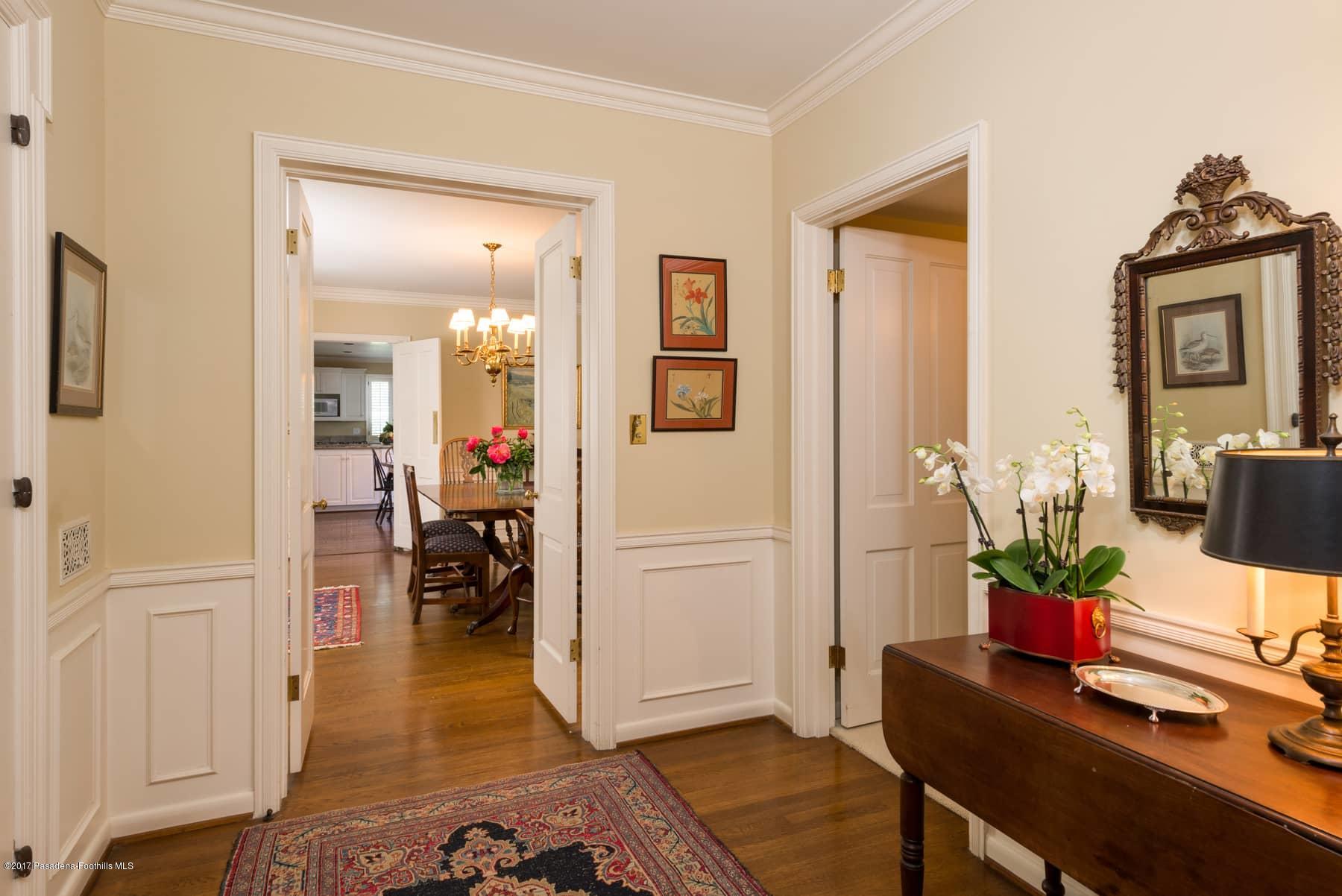 581 Busch Place Pasadena, CA 91105 - Photo 13 of 44 a workspace with furniture and wooden floor
