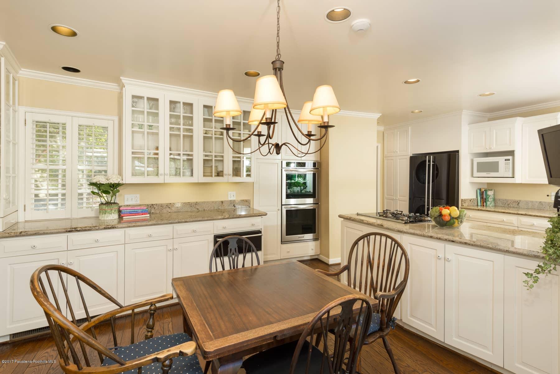 581 Busch Place Pasadena, CA 91105 - Photo 18 of 44 a view of a dining room and chairs in a kitchen