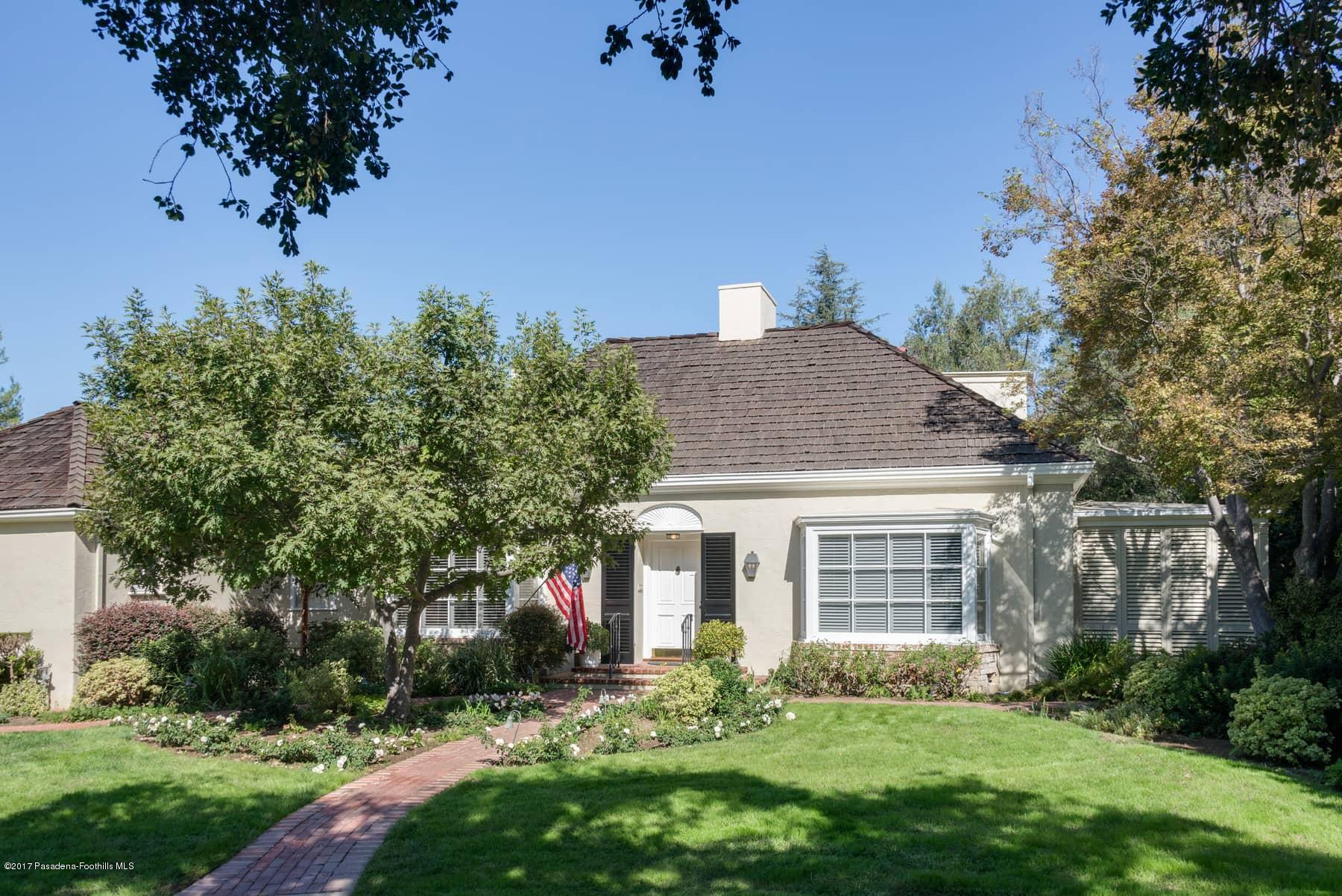 581 Busch Place Pasadena, CA 91105 - Photo 2 of 44 a front view of a house with a yard