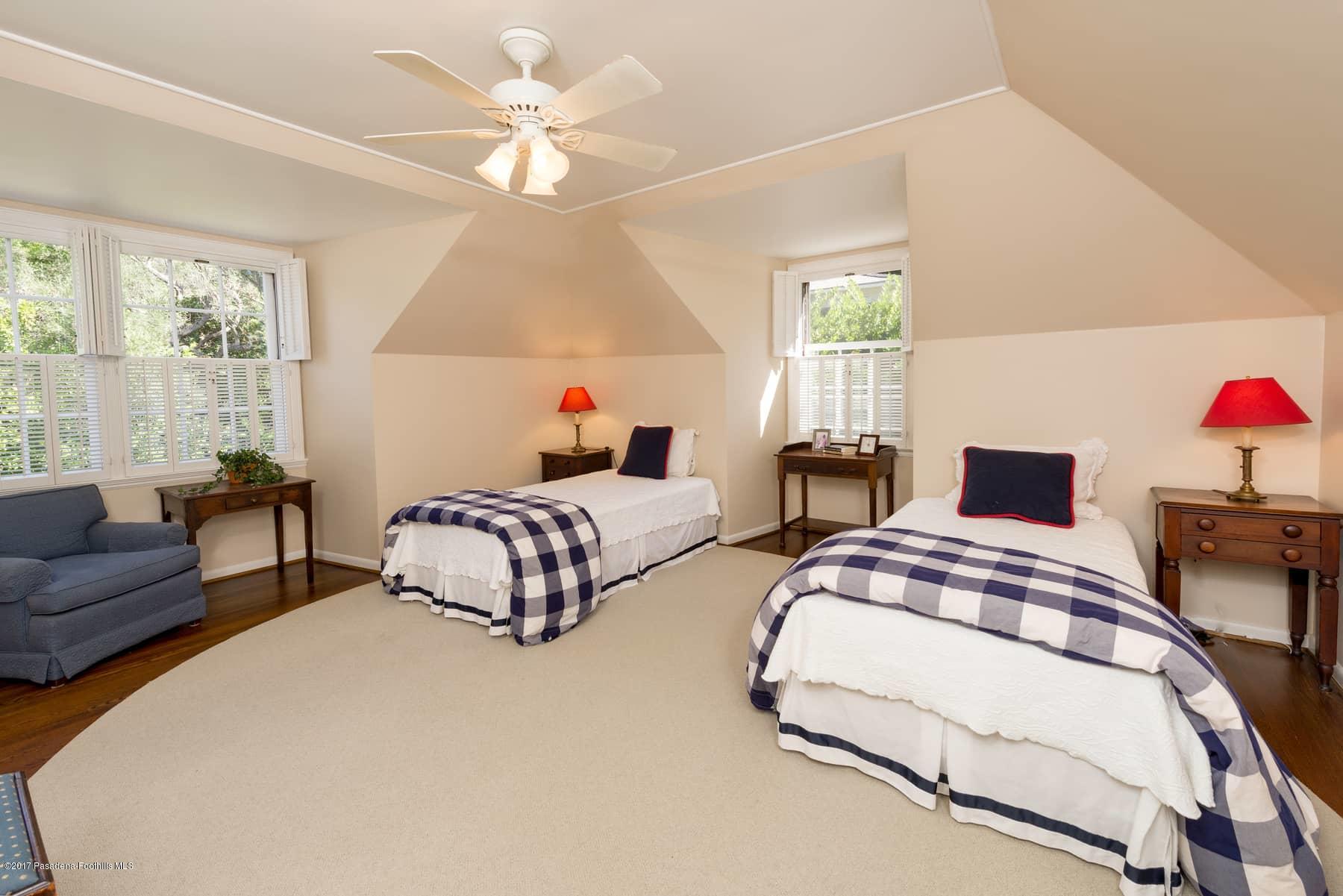 581 Busch Place Pasadena, CA 91105 - Photo 35 of 44 a bedroom with two beds and a chandelier