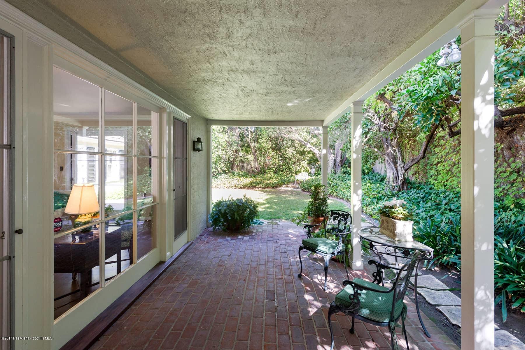 581 Busch Place Pasadena, CA 91105 - Photo 37 of 44 a view of a porch with chairs and backyard