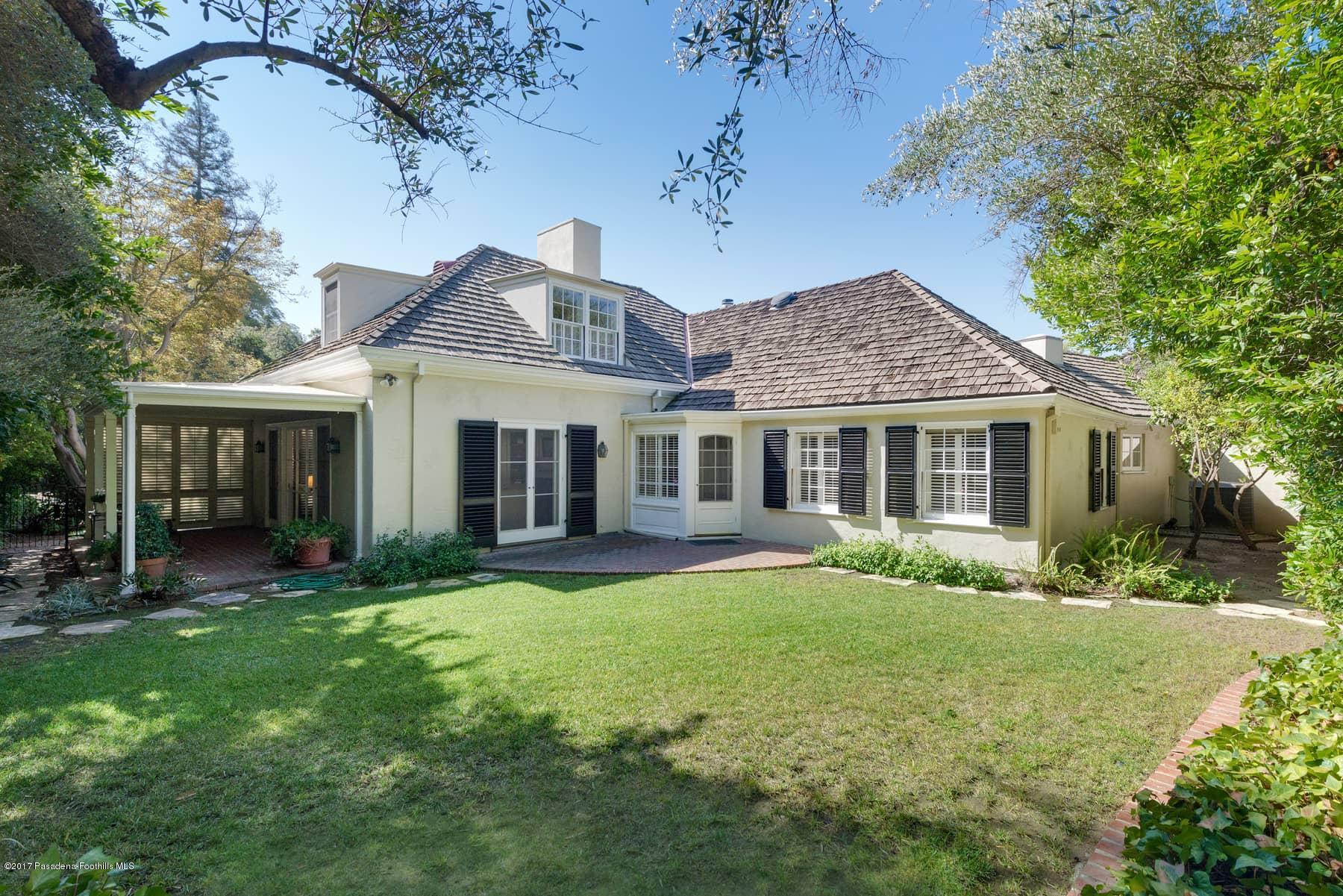 581 Busch Place Pasadena, CA 91105 - Photo 41 of 44 a front view of a house with a garden and porch