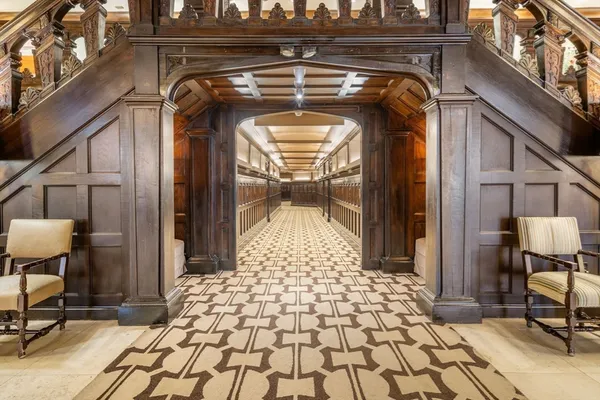 a view of a entryway door with wooden floor