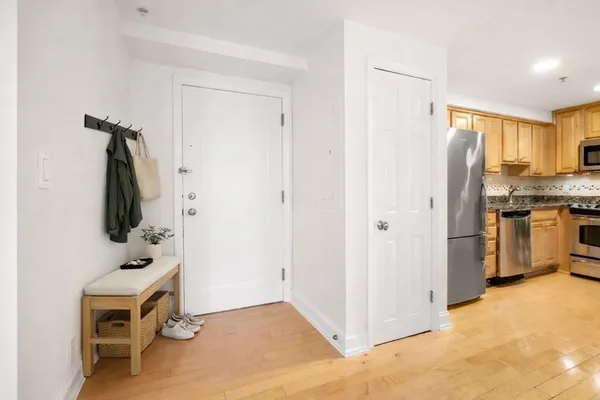 a view of a kitchen with storage and utility