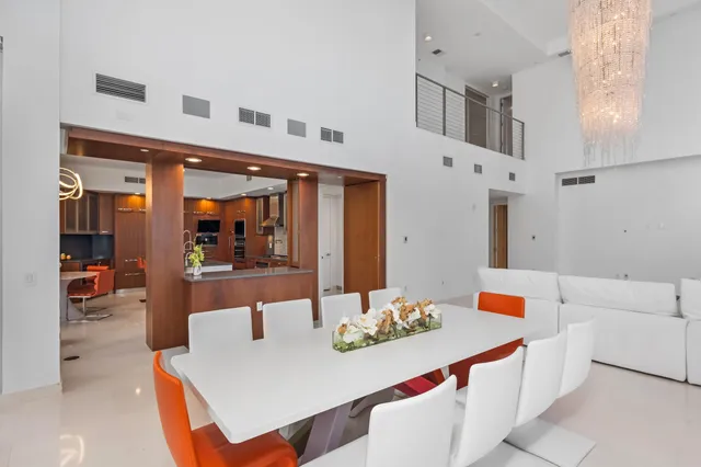 a kitchen with stainless steel appliances granite countertop a sink and cabinets