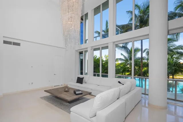 a view of a living room and entryway