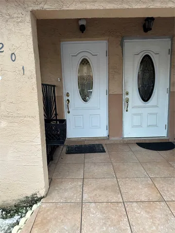 a view of a utility room with washer and dryer