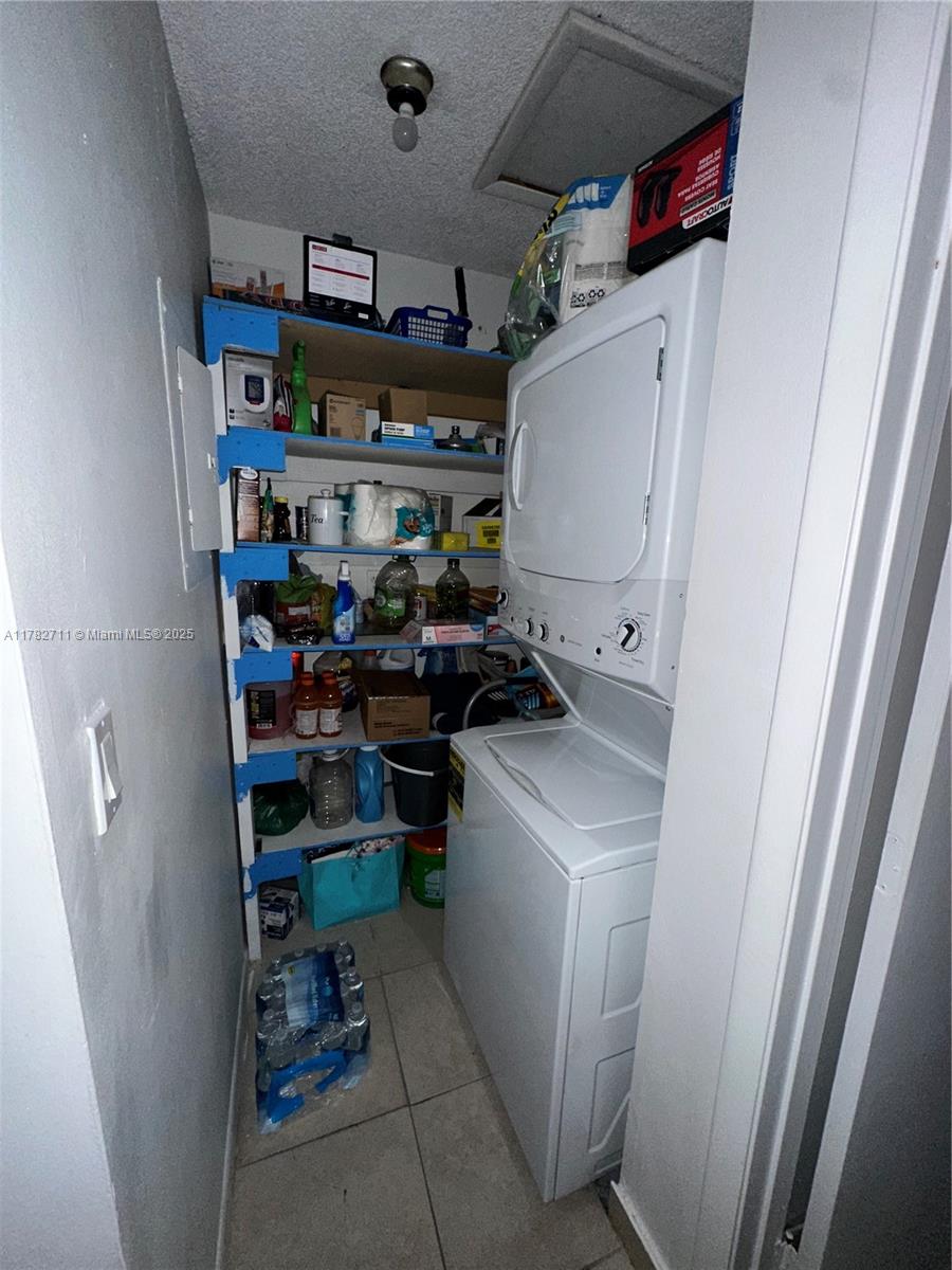 7795 West 29th Way, Unit 201 Hialeah, FL 33018 - Photo 11 of 15 a room with storage and utility