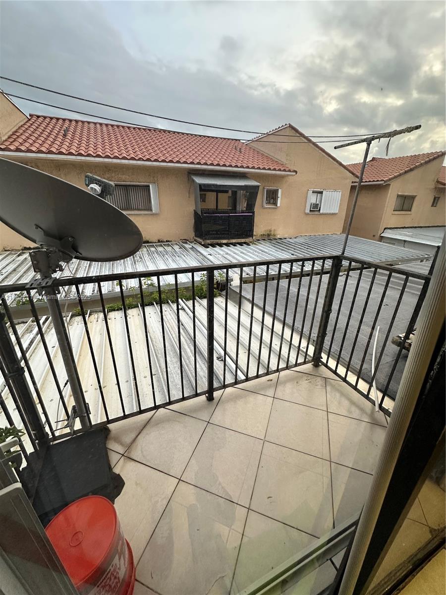 7795 West 29th Way, Unit 201 Hialeah, FL 33018 - Photo 4 of 15 a view of a balcony