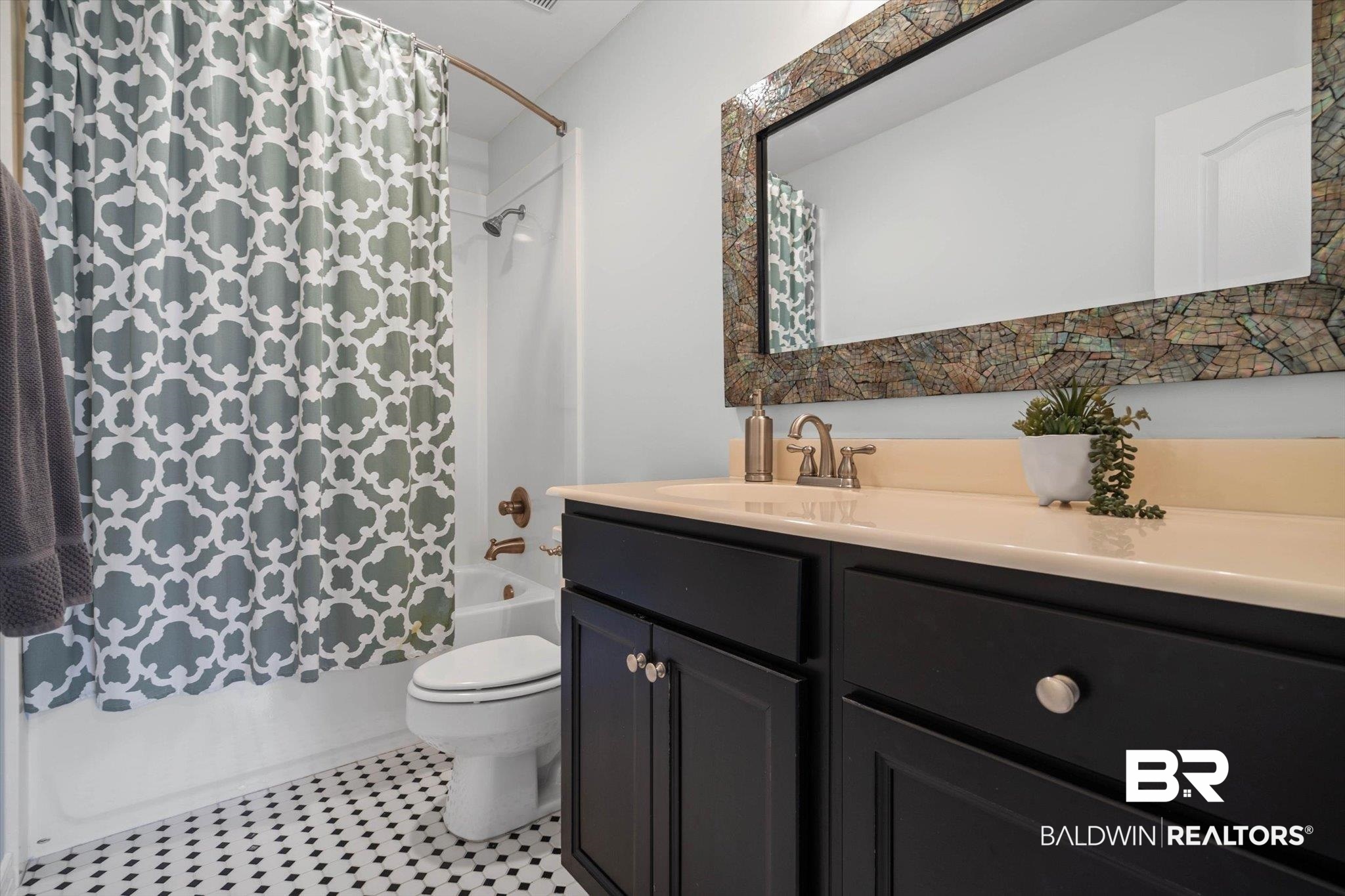 31369 Blakeley Way Daphne, AL 36527 - Photo 14 of 38 Full bathroom with shower / tub combo with curtain, vanity, and light tile patterned flooring