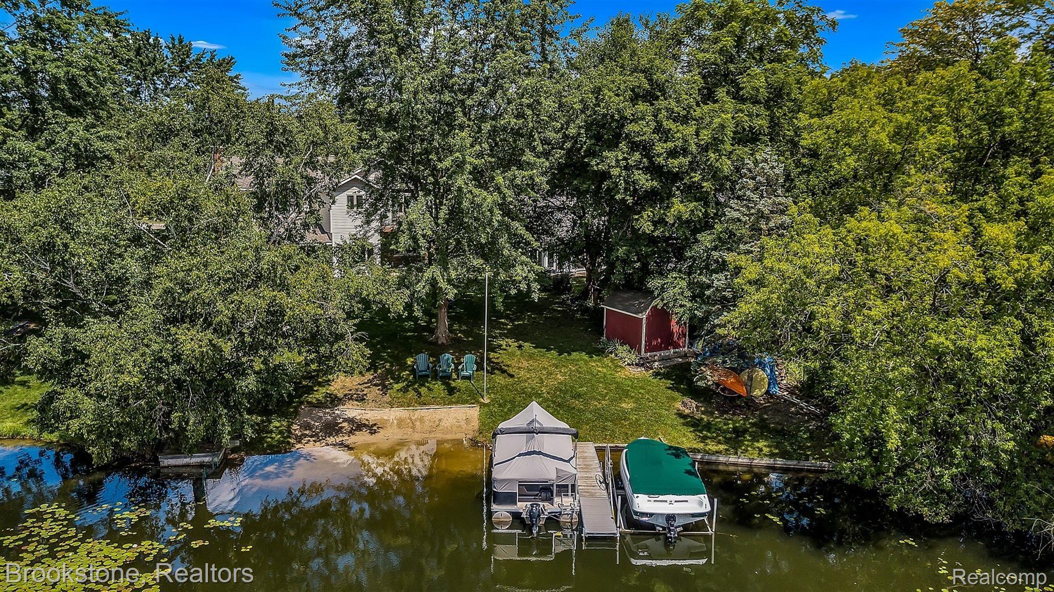 8715 Waumegah Road Clarkston, MI 48348 - Photo 44 of 60 49-8715 Waumegah Rd-WindowStill-Rea.jpg