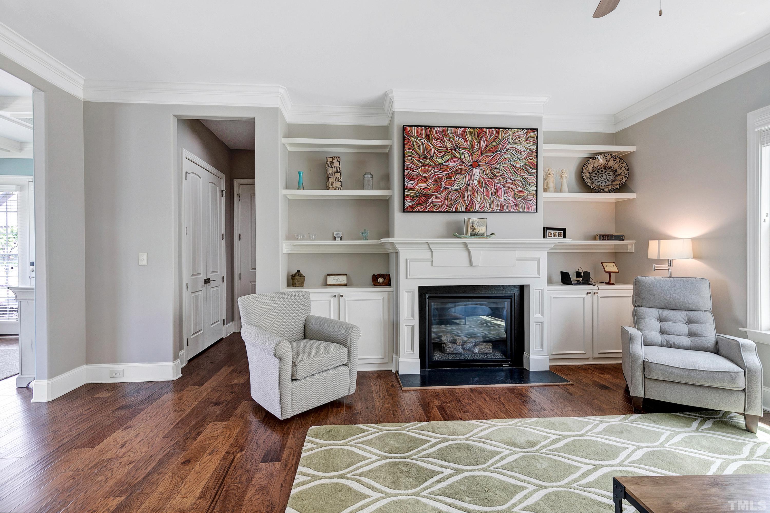 1001 Ambergate Station Apex, NC 27502 - Photo 16 of 49 a living room with furniture and a fireplace