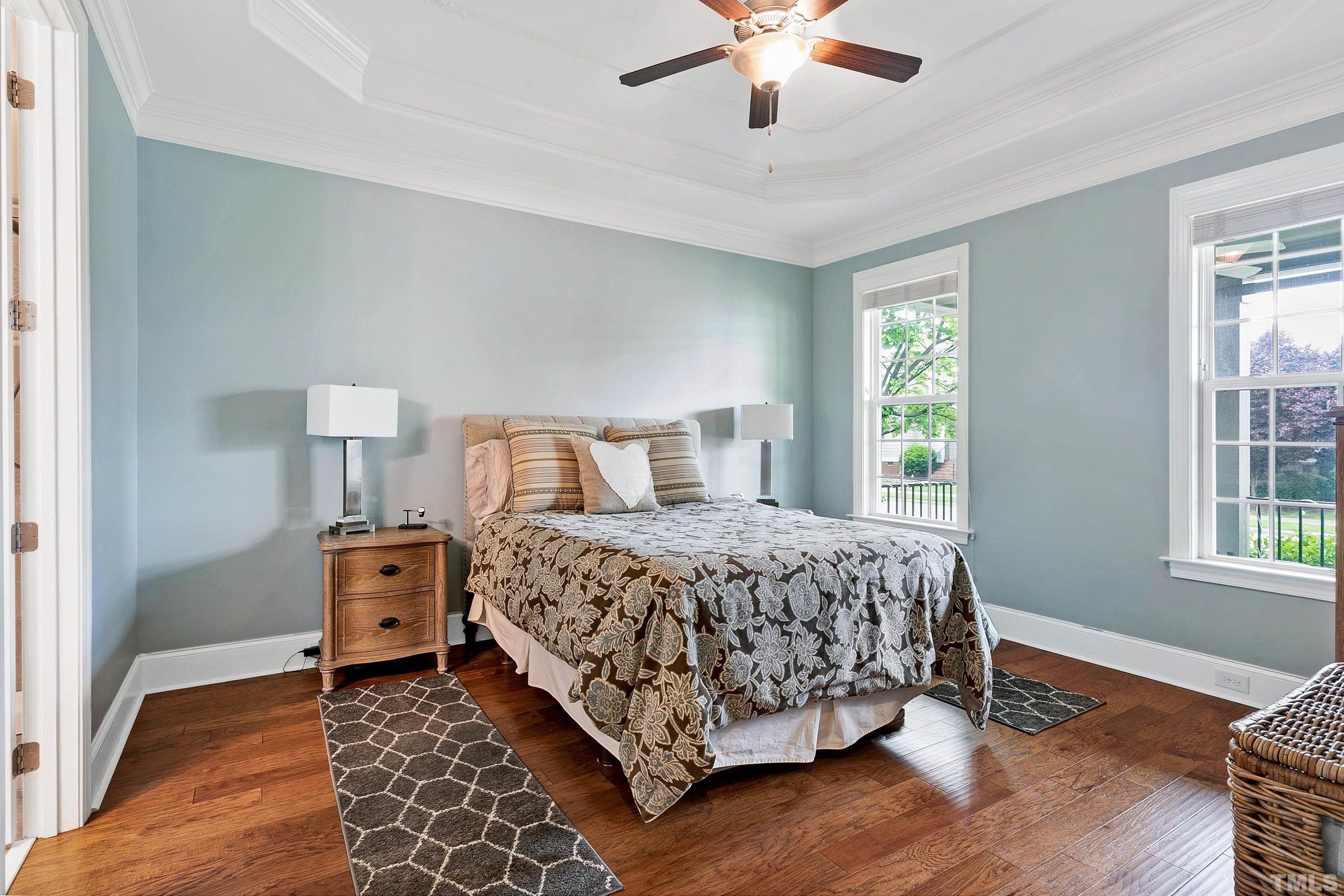 1001 Ambergate Station Apex, NC 27502 - Photo 17 of 49 a bedroom with a bed and window