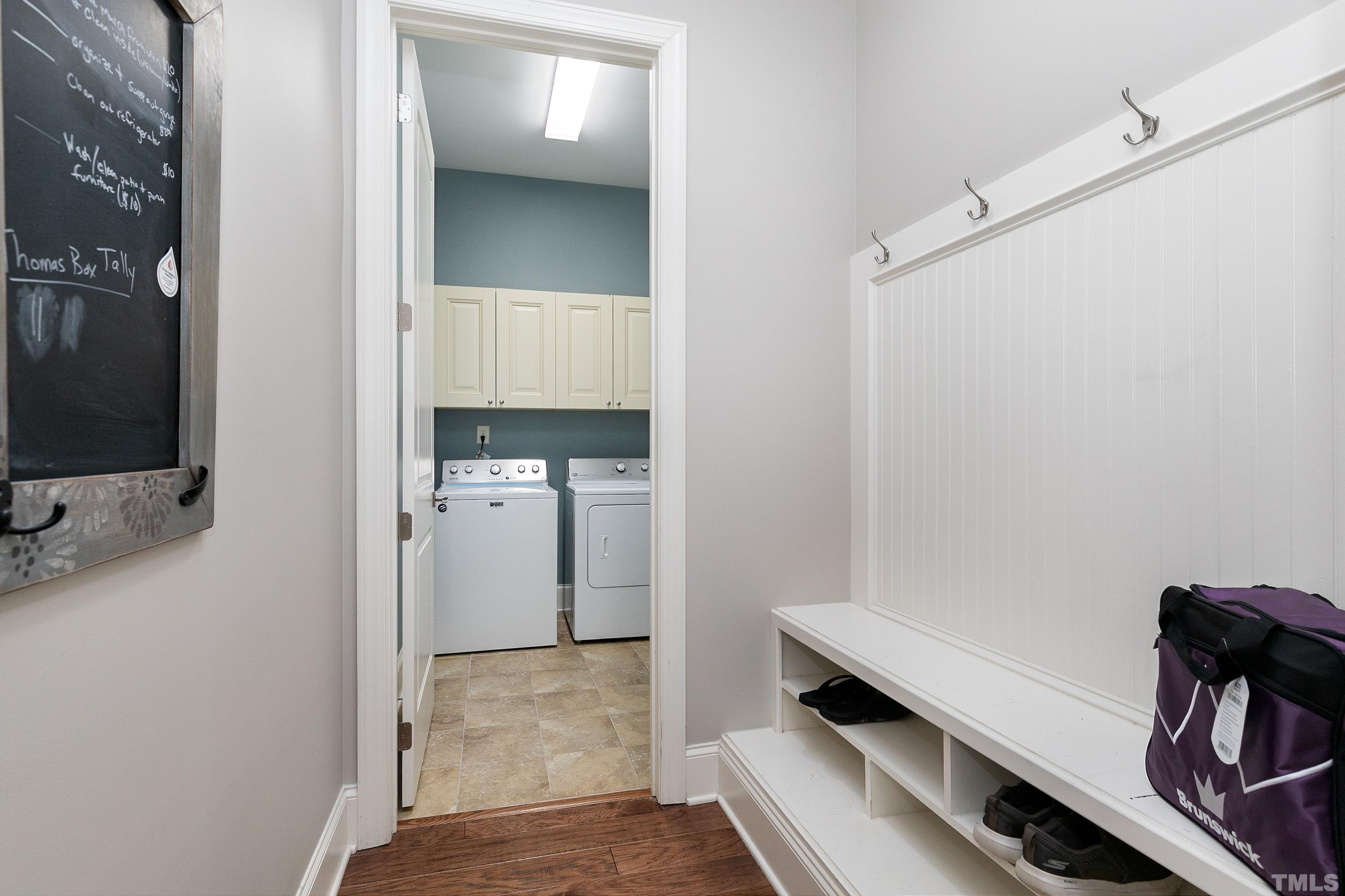 1001 Ambergate Station Apex, NC 27502 - Photo 23 of 49 a view of hallway with washer and dryer