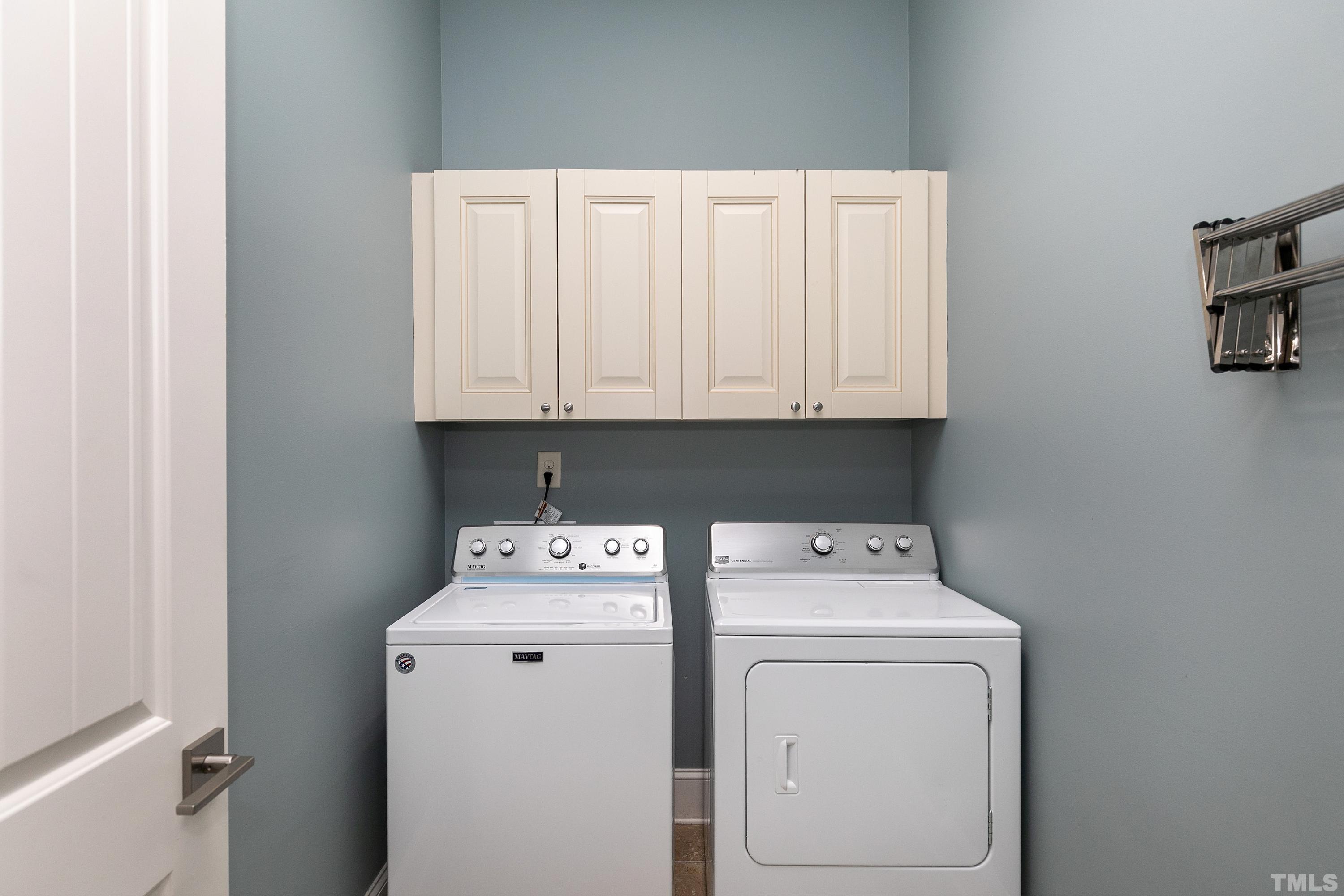 1001 Ambergate Station Apex, NC 27502 - Photo 24 of 49 a utility room with dryer and washer