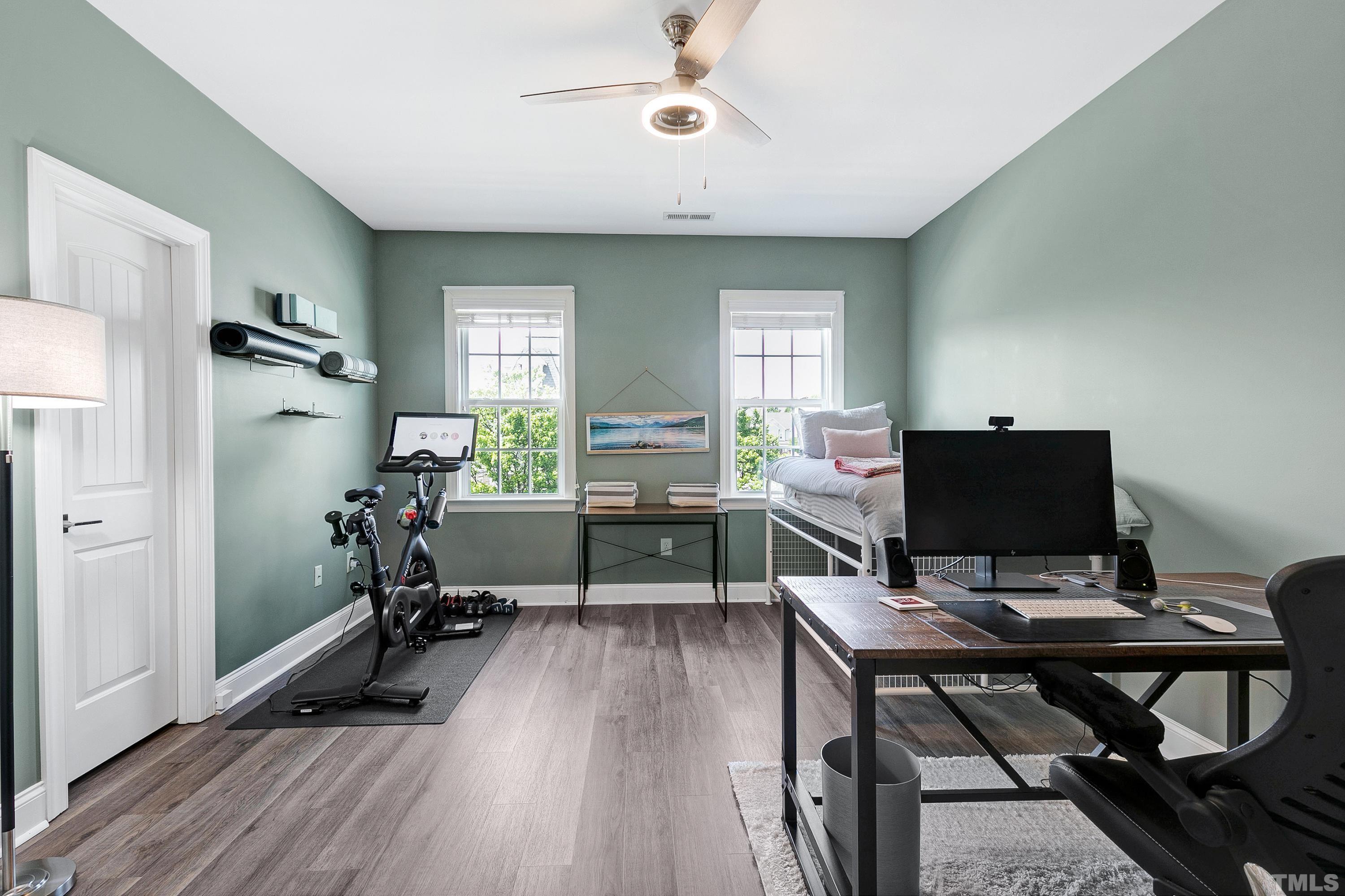 1001 Ambergate Station Apex, NC 27502 - Photo 26 of 49 a view of a workspace with furniture and a window