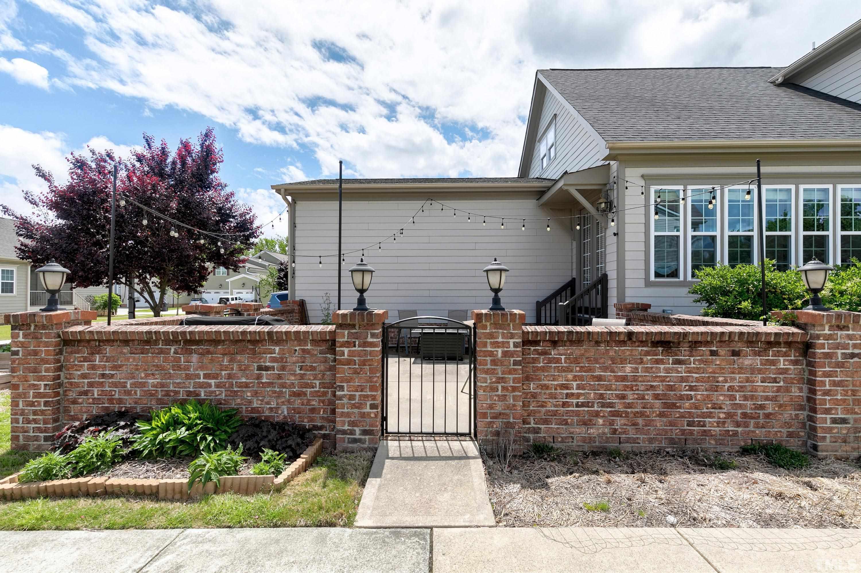 1001 Ambergate Station Apex, NC 27502 - Photo 36 of 49 front view of a house with a garden