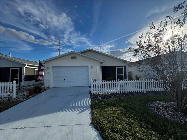 a front view of a house having yard