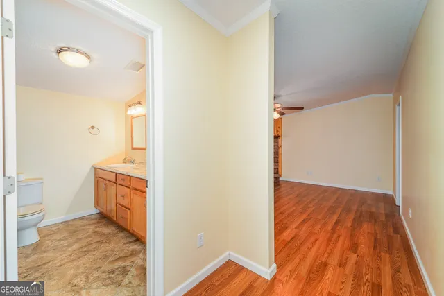 a view of a bathroom sink and a toilet