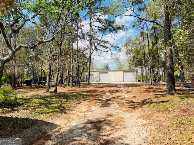 a fire hydrant in middle of a field