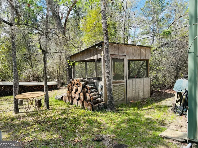 a house with trees in front of it